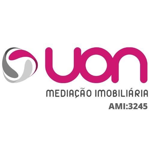 UON Imobiliária logo